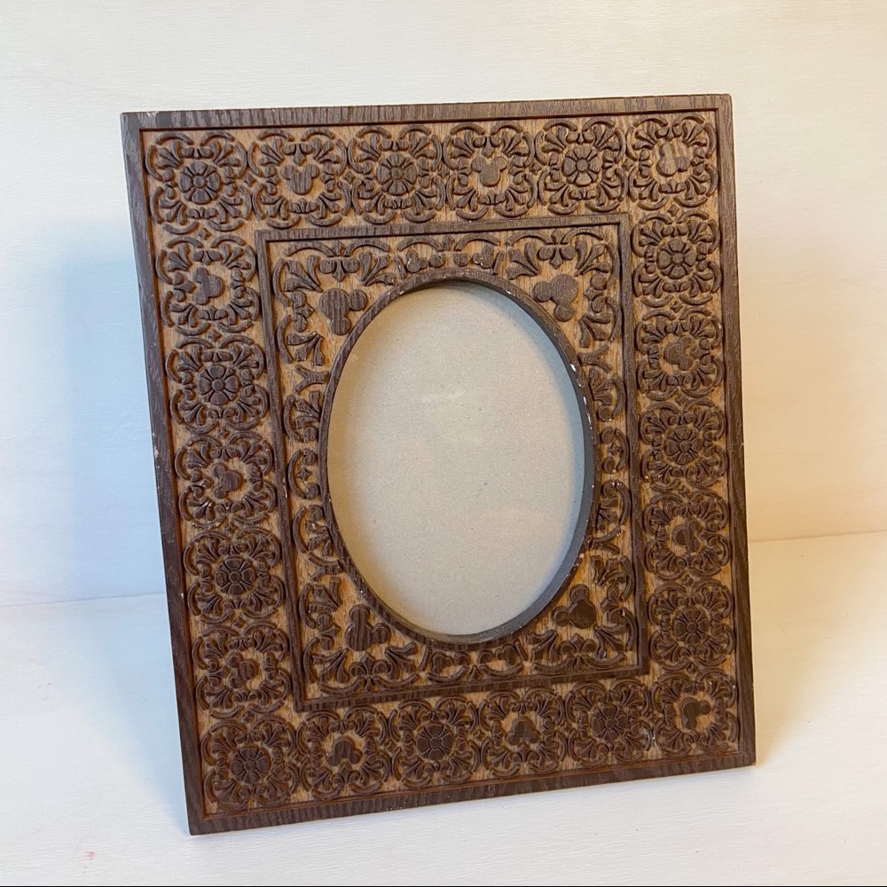 Hidden Mickey carved wood frame Disney parks.